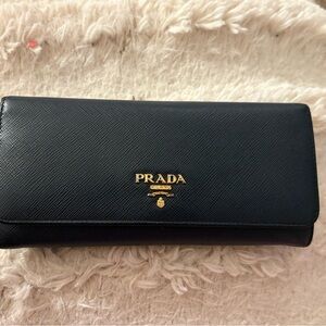 Prada Black Leather wallet with Gold Accents